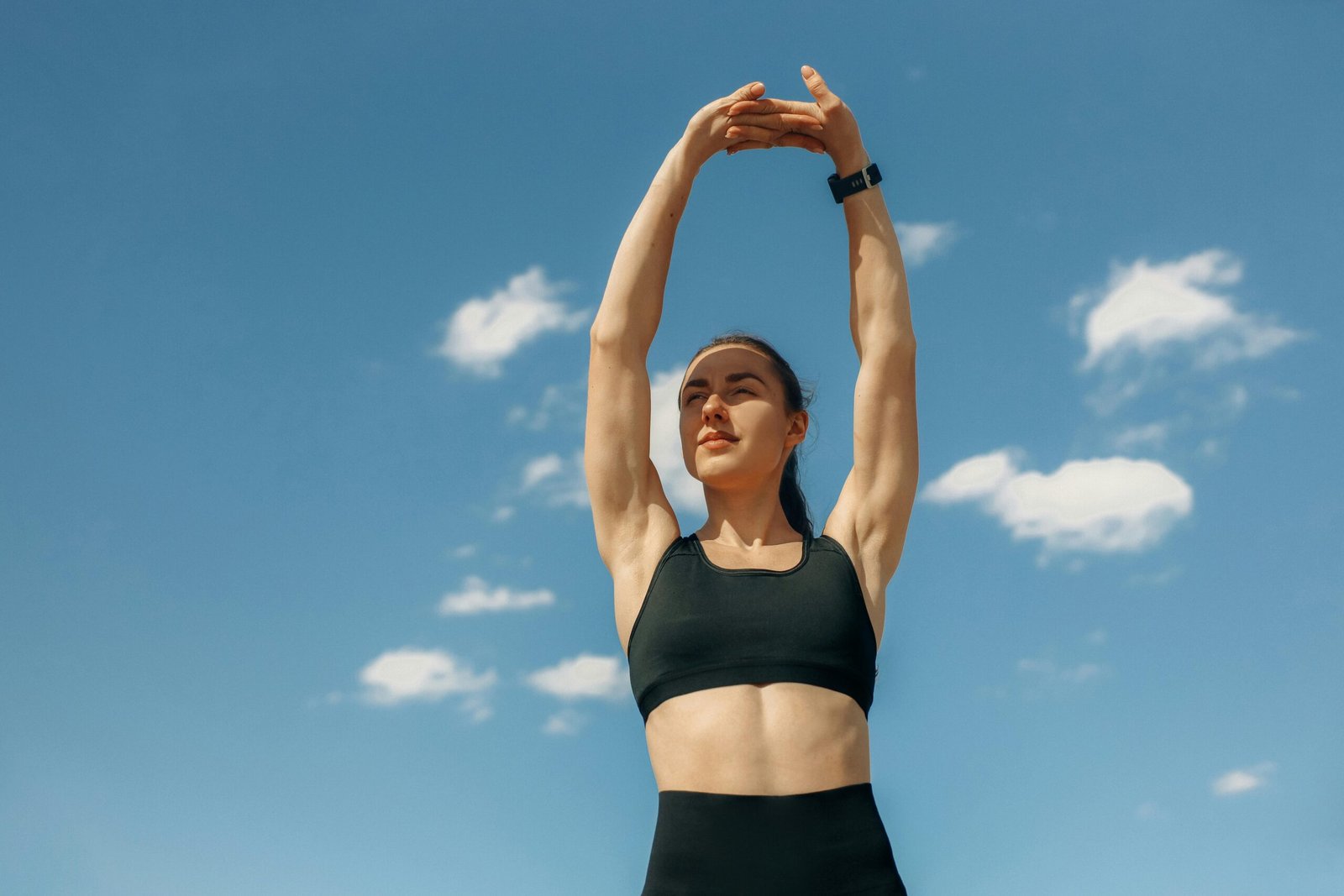 A woman exercising outdoors, showcasing renewed energy due to tongkat ali supplementation
